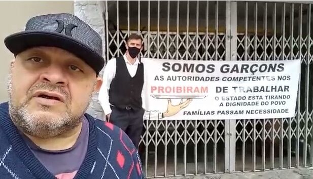  Empresários e funcionários protestam contra restrições da bandeira vermelha em Curitiba